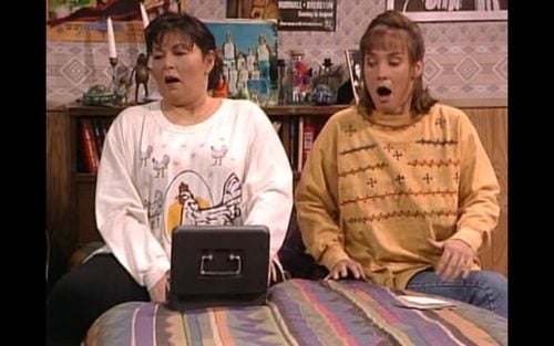 Roseanne wearing her chicken shirt